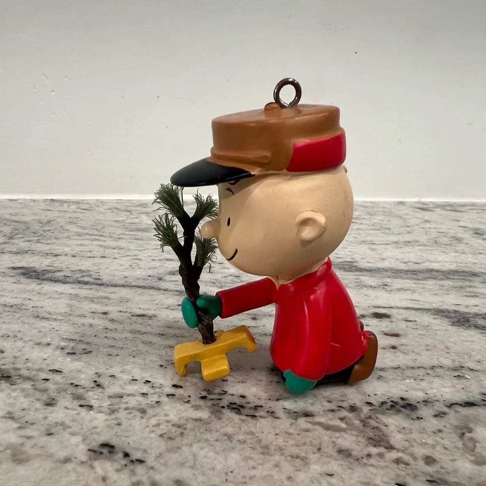 Hallmark Peanuts Charlie Brown Kneeling with Tree ornament